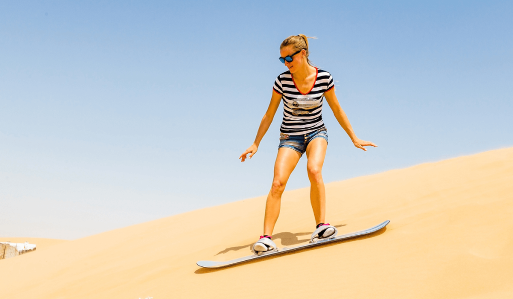 Sandboarding on the Desert Dunes